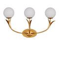 Front view with the sconce softly lit to highlight shape and metal texture