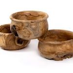 Cluster of three bowls with natural teak patterns, emphasizing organic shapes and varied coloration