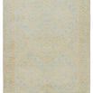 Winn Trellis rug with Persian-inspired diamond pattern in light blue, pastel green, yellow, and cream, zero-pile with shor...