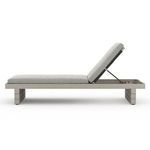 Side view with cushion fabric knit texture visible, showing backrest support mechanism