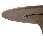 Underside of tabletop showing circular support mechanism attached to pedestal.