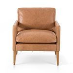 Front view of leather chair showcasing square cushions and slim tapered oak legs