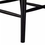 Close-up of bottom leg and footrest of Lewis Windsor Bar + Counter Stool showing smooth wood texture