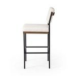 Benton Stool side view showing slim profile and straight black iron legs