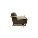 Side profile of Eckersley Lounge Chair showing seat depth and continuous oak armrest detail