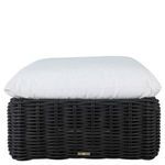 Front view of ottoman with white cushion top, showing woven base and label detail