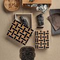 Open box with artifacts inside and lid resting nearby, showing scale and use of the smaller box