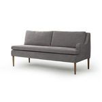 Side angled view showing curved armrest and seat cushion depth on Aurelia Dining Banquette
