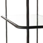 close-up angle highlighting hammered metal frame and clear glass shelf seam