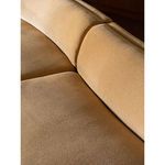 Detailed close-up of cushion seams and backrest connection on Naomi sectional in natural lighting