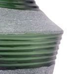 Close-up on the midsection textured frosted glass contrasting with smooth rippled green glass bands