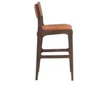 Side profile of brown leather stool highlighting curved backrest and wood frame detail