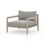 Angled side view showing chair depth and rope-like wrapping detail on armrests