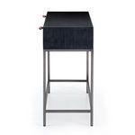 Side profile of Trey Console Table showing black wood panel and leather pull loops extending from drawers