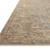 Low angled close-up of Heritage Ocean Sand Rug showing its flat weave and detailed border pattern