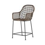 Angle view of Bandera Bar Stool highlighting wicker weaving and armrest structure