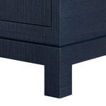 Close-up of Florence dresser’s corner leg showing textured selvage blue finish and minimal design