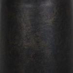 Close-up of the textured pedestal base showing sculptural shaping and finish