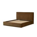 Quincy Bed with mattress removed showing wood slat foundation and fully upholstered frame in Surrey Ochre