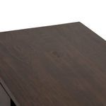 Distinctive grain patterns on walnut emphasizing natural wood character