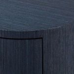 Close-up of textured selvage blue surface on rounded corner of Aaron end table