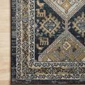Close-up of Jocelyn Navy Blue Rug corner highlighting intricate border design and color variation.