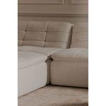 Close perspective on cushions of Lino slipper chairs emphasizing grid pattern and plush feel