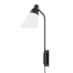 Black metal wall sconce with adjustable arm and angled white fabric shade, plugged-in cord visible