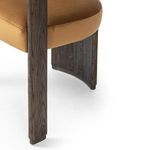 Close-up of dark oak leg and supporting rear panel with visible wood grain texture