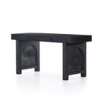 Straight side profile of Tilda desk showing thick wooden top and cane panel leg beneath