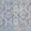 Zoomed-in view highlighting the rug's soft tonal Persian pattern with blue and beige stitching