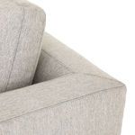 Top angled close-up highlighting stitching detail on armrest seam of Colt Sofa