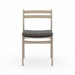 Close-up front view of Atherton chair highlighting ash cushion contour and wood tone texture