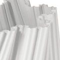 Close-up of the vase’s textured 3D-printed porcelain ribbing and scalloped irregular rim