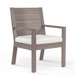 Laguna Dining Chair with driftwood-look aluminum frame and white cushioned seat