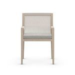 Cushion pattern and texture detail on front-facing chair