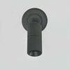 Directional wall sconce with circular backplate, mechanical hinge, and knurled 2-inch cylinder in distressed bronze