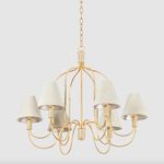 Warrensburg chandelier viewed from a lower angle emphasizing curved gold leaf swooping metalwork