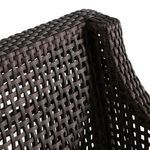 Close-up of dark brown woven rattan texture on Peninsula stool back corner