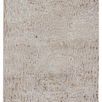 Kimball Animal Rug in beige and bronze tones featuring a bold leopard print pattern with a glamorous sheen
