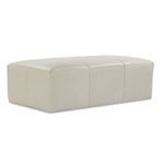 Beige leather ottoman without wooden side table viewed from front angle