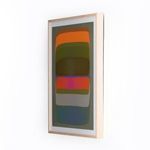 Tilted side view of the art piece highlighting the wooden frame's thickness and the artwork's layered colors