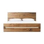 Three-quarter front view of Lia Bed with white bedding against plain white background