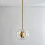 Pendant shown hanging in room with white ceiling and wall, centered in photo