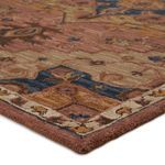 Close-up of rug corner showing dense tufting and color transitions in medallion pattern