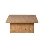 Square end view showing paneling on side and distinct joinery on oak coffee table