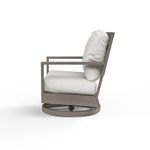 Side profile of Laguna Swivel Club Rocker highlighting angled backrest and swivel base