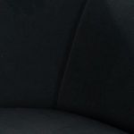 Repeat of detailed close-up of velvet arm and wood leg fusion