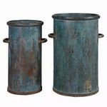Two tarnished copper cans showing a darker patina with a plain white background