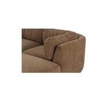 Close-up on the sectional's rounded armrest and plush woven chenille cushion